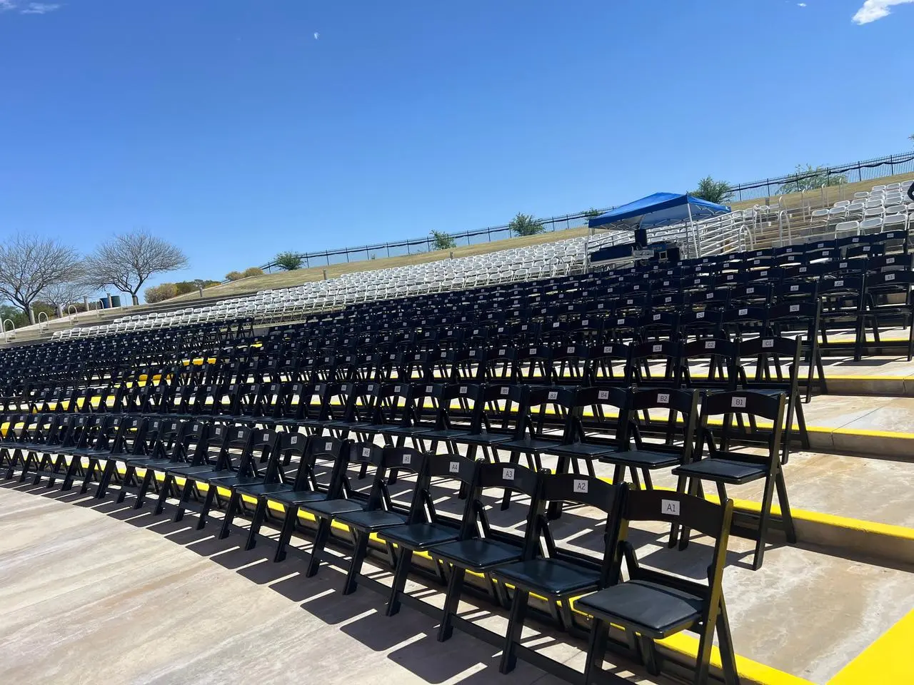 Outdoor Amphitheater Black Folding Chairs Seating Event Production Las Vegas